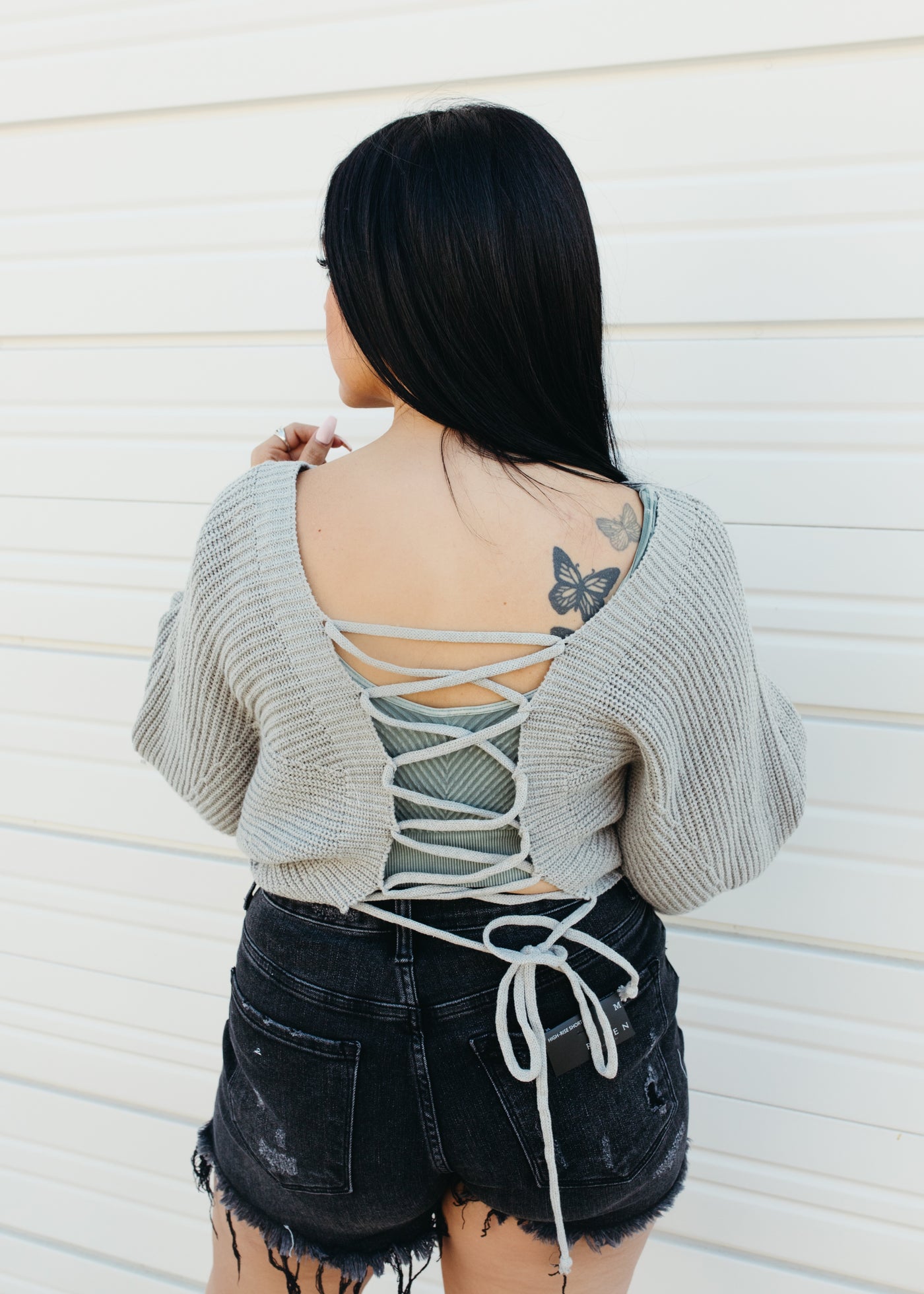 All Tied Up - Dolman Sleeve Back Lace Up Cable Knit Sweater